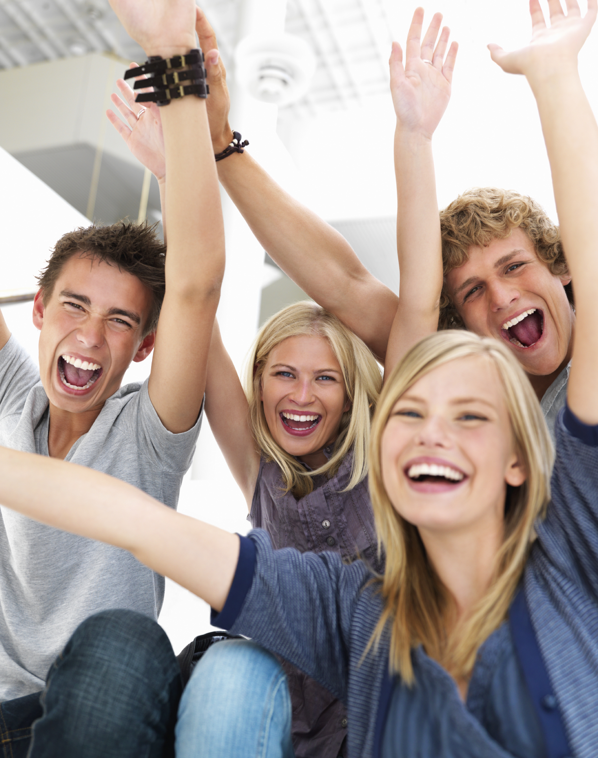 Marketing Ideas For Small Business Young business builders with arms raised in success